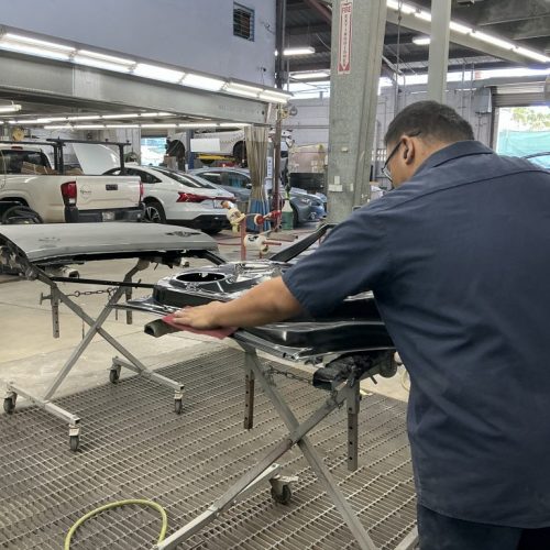 K.W. Auto Body Honolulu Repair Technician working on car repair