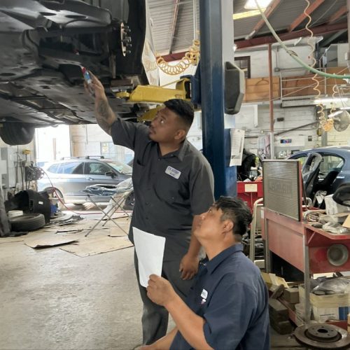 K.W. Auto Body Honolulu Repair Technicians working on car repair